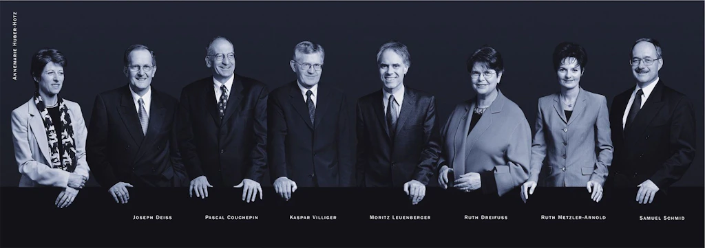 The members of the Federal Council (from left to right): Federal Chancellor Annemarie Huber-Hotz, Federal Councillor Joseph Deiss, Federal Councillor Pascal Couchepin, Federal Councillor Kaspar Villiger, President Moritz Leuenberger, Federal Councillor Ruth Dreifuss, Federal Councillor Ruth Metzler, Federal Councillor Samuel Schmid